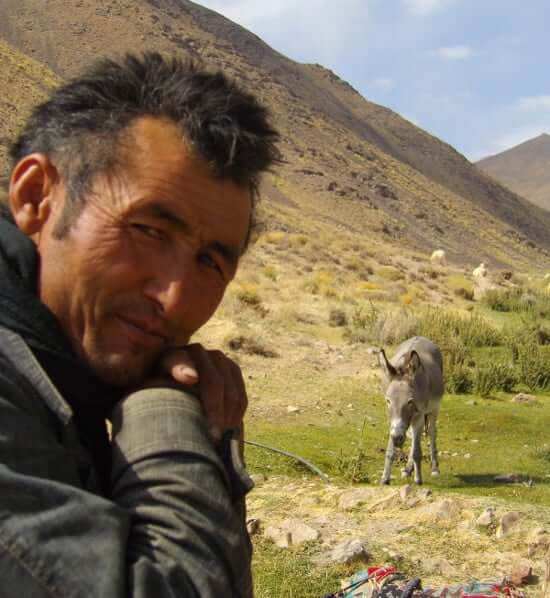 Chance encounter of a shepherd in the mountains of Abyaneh keeping his sheep 